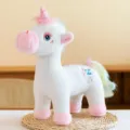 Charming soft white unicorn plush toy featuring a colorful rainbow mane and tail - 35cm / White