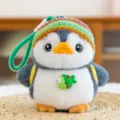 Cute penguin plush pendant with colorful knitted hat for backpack decoration and keys - Backpack Style / 15cm