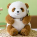 Adorable brown and white lifelike plush panda toy sitting on a natural woven mat - Brown / 25cm