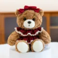 Niedlicher brauner Plüsch-Teddybär mit rotem Karo-Kleid und roter Schleifendekoration - 15cm / Rotes Karokleid