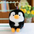 Plush penguin ball keychain with soft black and white fur and gold ring - 13cm / Penguin