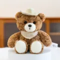 Niedlicher brauner Plüschteddybär mit Cowboyhut und Schal für die Schreibtischdeko - 15cm / Orange scarf hat style