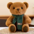 Adorable 8-inch brown teddy bear plush toy wearing a green knitted scarf accessory - Scarf Style / Coffee