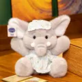 Simpatico elefante di peluche con pigiama a fiori azzurro e mascherina per dormire coordinata - Stile pigiama / Grigio / 32cm
