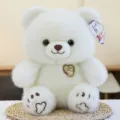 Oso de peluche blanco suave con insignia giratoria de corazón para regalos infantiles - Blanco / 25cm