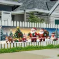Festive outdoor Christmas banner with Santa and reindeer cartoon design on a fence - Christmas Cartoon (SHF-004) / 30x120cm