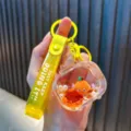 Süßer gelber Treibsand-Schlüsselanhänger mit Cartoon-Orangen-Anhänger für Handtaschen - Orange