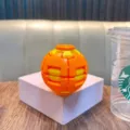 Orange and yellow 3D sensory gear fidget ball toy for stress relief and focusing - No Keychain / Orange