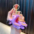 Purple toy scooter keychain with inertia pull-back feature for kids - Purple
