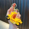 Yellow mini inertia motor scooter keychain toy with gold ring for bags or car keys - Yellow