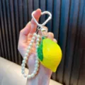 Schattige realistische citroen sleutelhanger met parels en hartclip voor damestassen - Groene Citroen