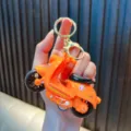 Bright orange creative inertial motor scooter keychain toy with golden lobster clasp - Orange