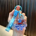 Cute blue acrylic oil-filled jellyfish keychain with liquid sailboat and glitter strap - Blue
