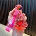 Cute pink acrylic octopus liquid oil keychain with sailboat and glitters ocean theme - Red