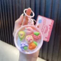 Lindo llavero rosa con temática de frutas y postres que incluye varios mini dijes decorativos - 粉色-水果