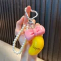 Creatieve citroen sleutelhanger met roze strik en elegante witte parelkraal ketting item - Roze Banaan