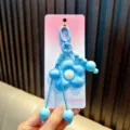 Llavero de flor azul color caramelo con cuerda trenzada y cuentas para colgar en bolso - Azul