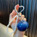 Creatieve blauwe bes sleutelhanger met elegante parels en zilveren hartvormige clip - Kunstmatige Blauwe Bes / Blauwe bes