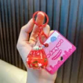 Roter Weihnachtsstrumpf-Schlüsselanhänger mit Treibsand-Flasche und Acrylanhänger - Diamant