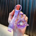 Cute purple cartoon fish oil liquid quicksand keychain with penguin pendant and glitter stars - Purple Penguin / Purple