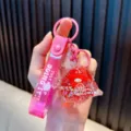 Adorable pink ocean fish liquid quicksand keychain with star glitters and hand strap - Red Sea Animal / Red
