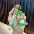 Green marine fish oil-filled keychain with liquid glitter and a motivational strap. - Green Whale / Green