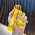 Yellow ocean fish liquid quicksand keychain with glitter wrist strap for bags - Yellow