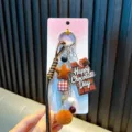 Porte-clés barre de chocolat mignon avec pompon en peluche marron et perles d'étoiles - Marron