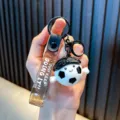 Leuke cartoon voetbal PVC sleutelhanger met motiverende band voor tassen en sleutels - Zwart