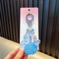Sparkling blue glitter shell and mermaid tail acrylic keychain for phone or car keys. - Blue
