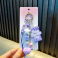 Porte-clés tablette de chocolat violet avec pompon lavande et perles décoratives - Violet