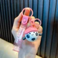 Leuke roze cartoon voetbalpop sleutelhanger met glitterband voor tasaccessoires - Roze