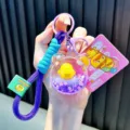 Paarse gevlochten touw sleutelhanger met Genki Little Yellow Duck vloeibare bedel - Paars