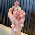 Pink beaded phone strap with iridescent crystal beads and elegant bow charm keychain accessory - Pink