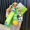 Cute green panda keychain with glowing LED light bulb and silicone strap - Lying Panda Bulb / Green