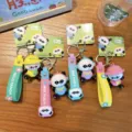 Lot de quatre porte-clés panda mignons avec sangles en silicone colorées et charms - Panda Musique / Panda Musique (1 Pièce)