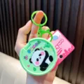 Kreativer grüner runder Panda-Klappspiegel-Schlüsselanhänger mit lustiger Musikspielfunktion - Panda / Grün