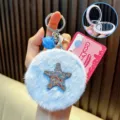 Lindo llavero de espejo plegable portátil de estrella de mar de felpa en azul claro con cascabel - Azul