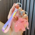 Pink jelly acrylic elephant keychain with heart detail and holographic wrist strap - Pink