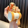 Fun mini megaphone shaped keychain in orange and cream with electronic voice recording function - Brown Speaker