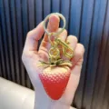 Realistic 3D resin strawberry keychain and cute bag charm in vibrant red with gold ring - Mixed Color Medium Strawberry (Keychain) / Color Block
