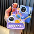 Purple astronaut mini piano toy keychain variant with musical theme and character card. - Astronaut Piano / Purple