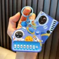 Astronaut toy piano keychain featuring purple finish and music buttons - Astronaut Piano / Blue