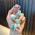 Llavero de unicornio adorable con pompón azul y mosquetón en forma de nube para bolsos - Azul