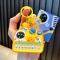 Cute yellow astronaut toy piano keychain music machine schoolbag pendant for students - Astronaut Piano / Yellow