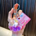 Porte-clés coquillage violet avec sable mouvant liquide et petit chien - Violet