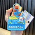 Blue toy piano keychain with cute dog character and numbered music keys - White Dog Piano / Blue