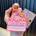 Pink puppy mini toy piano keychain featuring numbered keys and cute cartoon dog charm - Shiba Inu Piano / Pink