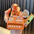 Cute cartoon panda mini piano keychain music machine in orange - Fun Panda Piano / Coffee