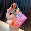 Süßer Acryl-Schlüsselanhänger mit rosa schwebendem Fußball und Treibsand-Effekt - Rosa